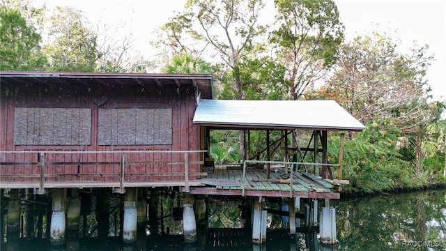 dock area with a water view