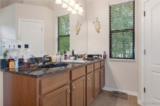 bathroom with vanity and tile patterned flooring