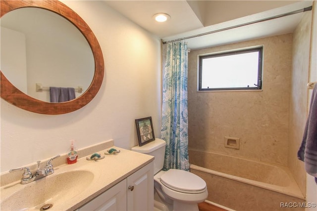 full bathroom with toilet, shower / bathtub combination with curtain, and vanity