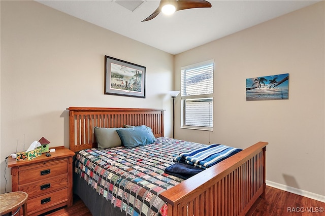 bedroom featuring ceiling fan and dark hardwood / wood-style flooring