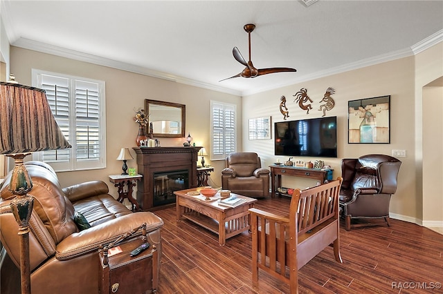 living room featuring ceiling fan, crown molding, and dark wood-type flooring