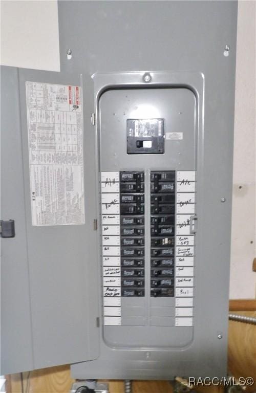 utility room featuring electric panel