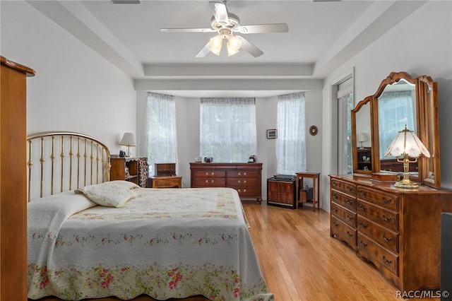 bedroom featuring ceiling fan and light hardwood / wood-style floors