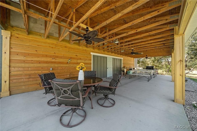 view of patio / terrace featuring ceiling fan and outdoor dining area