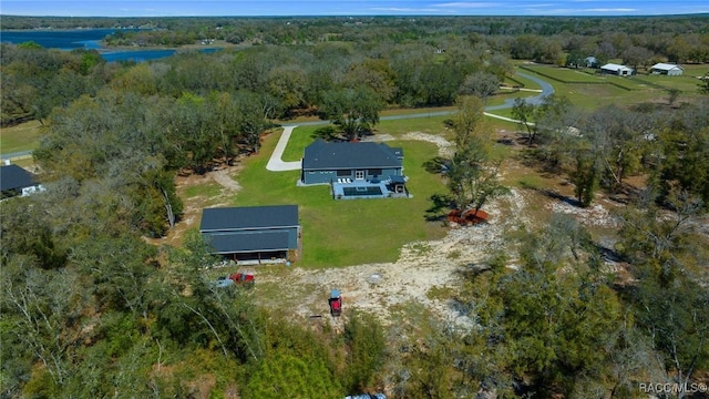 drone / aerial view with a forest view