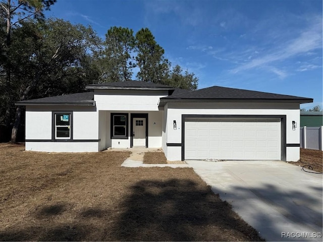 view of front of property with a garage