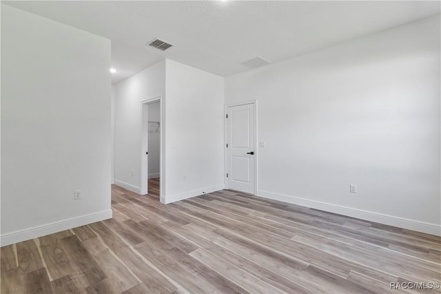 1413 W America Pl, Citrus Springs, FL 34434 - unfurnished room featuring visible vents, recessed lighting, light wood-style flooring, and baseboards