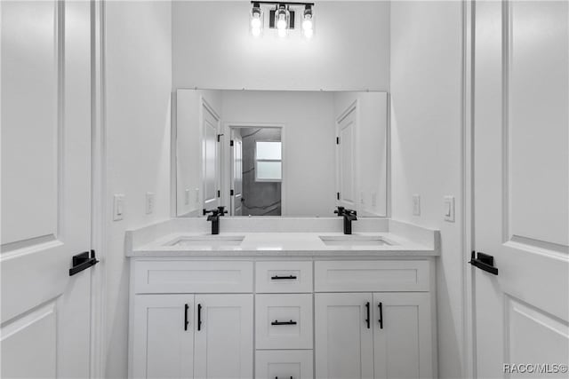 1413 W America Pl, Citrus Springs, FL 34434 - bathroom with double vanity and a sink