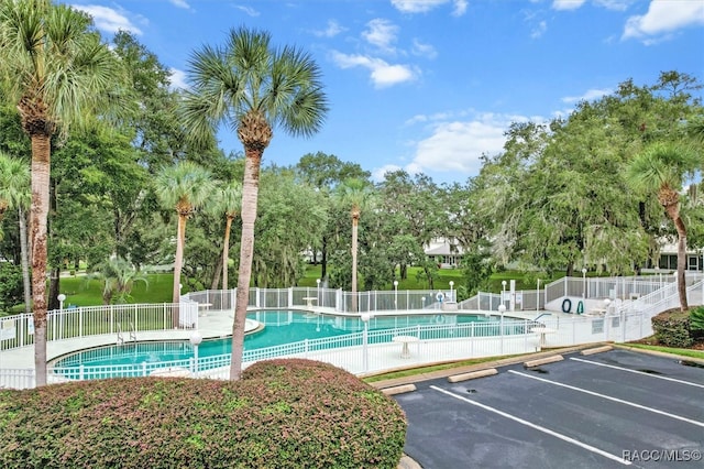 view of swimming pool featuring a patio