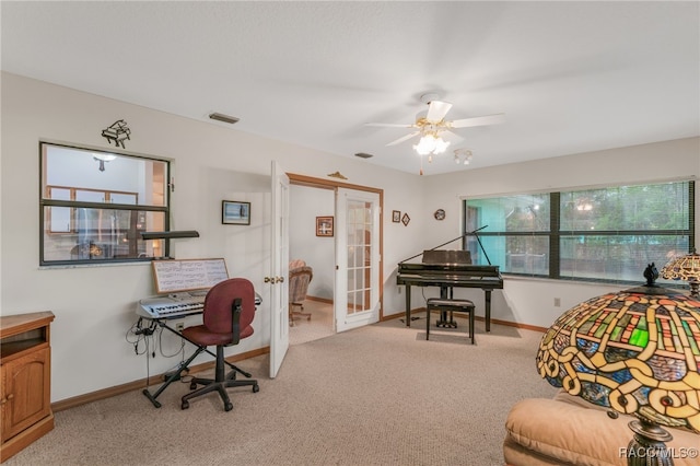 carpeted office with french doors, visible vents, and baseboards