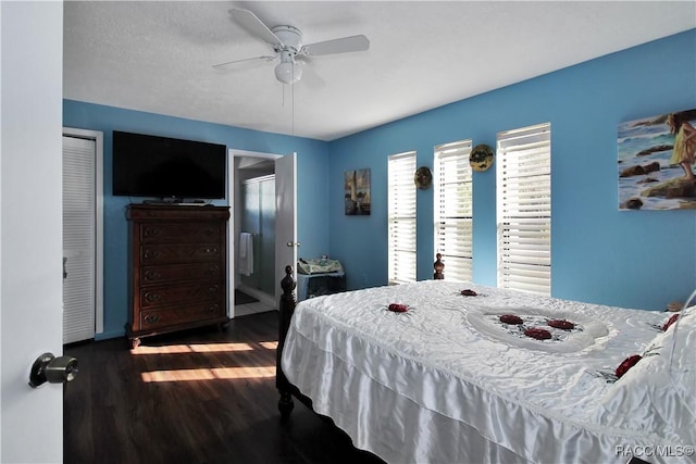 bedroom featuring ceiling fan and dark wood-type flooring