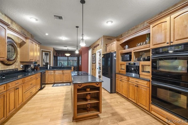 kitchen featuring visible vents, open shelves, a peninsula, black appliances, and dark countertops