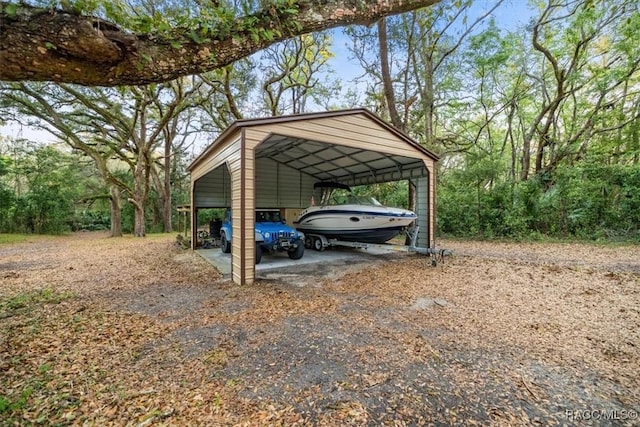 view of parking featuring a carport and driveway