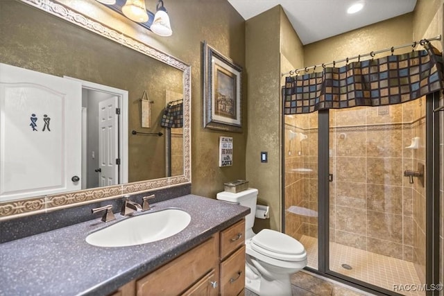 full bath with a shower stall, toilet, and a textured wall