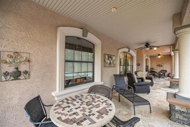 view of patio with ceiling fan