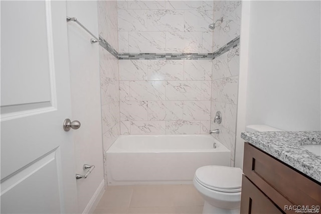 full bathroom featuring tile patterned flooring, vanity, toilet, and tiled shower / bath