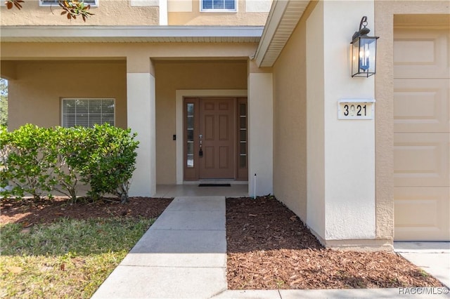 doorway to property featuring a porch