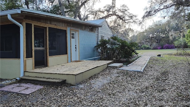 exterior space with a sunroom