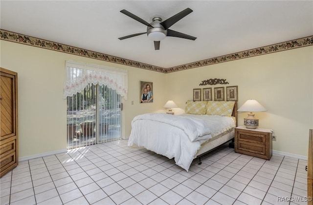 bedroom with access to exterior, ceiling fan, light tile patterned floors, and baseboards