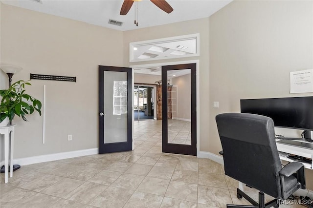 home office featuring french doors and ceiling fan