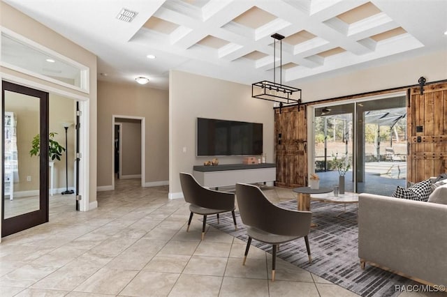 tiled living room with beamed ceiling, a towering ceiling, coffered ceiling, and a barn door