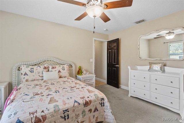 carpeted bedroom featuring ceiling fan