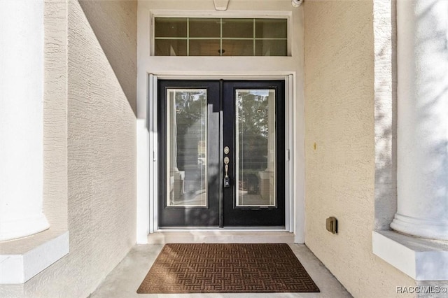 entrance to property with french doors