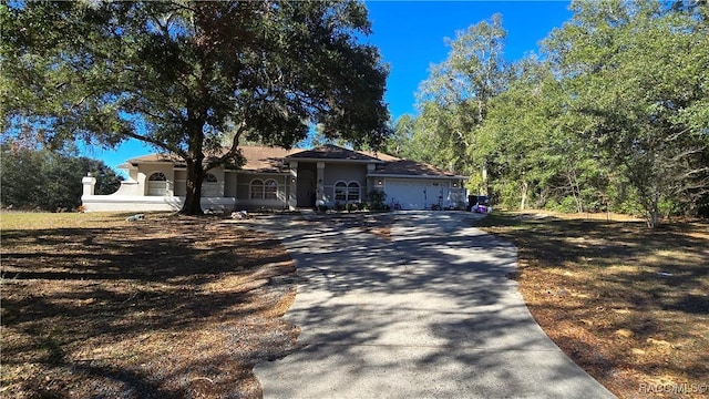 ranch-style house with a garage