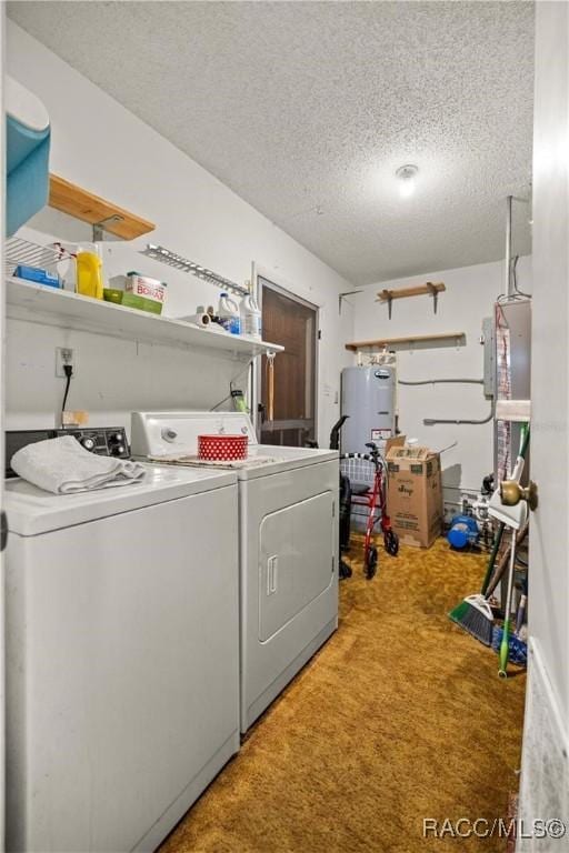 9708 W Hawthorne St, Crystal River, FL 34428 - laundry area featuring washer and clothes dryer, laundry area, a textured ceiling, water heater, and carpet floors