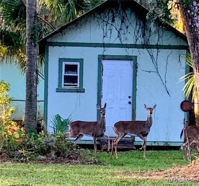 9708 W Hawthorne St, Crystal River, FL 34428 - view of outbuilding with fence