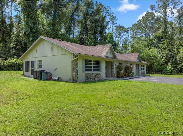 view of front of property with a front lawn