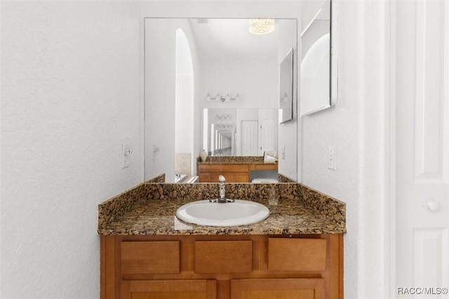 12 Colubrina Ct, Homosassa, FL 34446 - bathroom featuring vanity and a textured wall