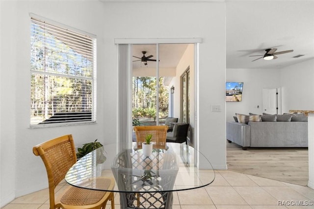 12 Colubrina Ct, Homosassa, FL 34446 - dining room featuring a ceiling fan and light tile patterned floors