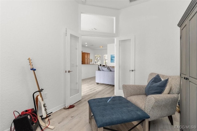 12 Colubrina Ct, Homosassa, FL 34446 - sitting room featuring light wood-style floors and baseboards