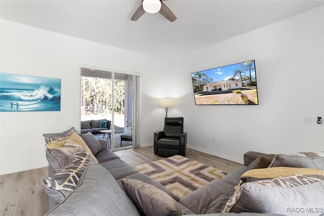 12 Colubrina Ct, Homosassa, FL 34446 - living area with ceiling fan, wood finished floors, and baseboards