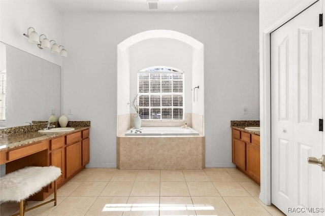 12 Colubrina Ct, Homosassa, FL 34446 - full bath featuring two vanities, a bath, and tile patterned floors