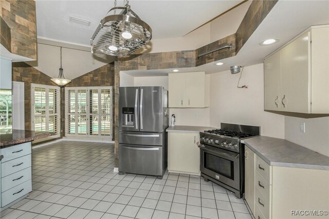 750 NW Snug Harbor Rd, Crystal River, FL 34428 - kitchen featuring appliances with stainless steel finishes, light tile patterned floors, hanging light fixtures, white cabinetry, and recessed lighting