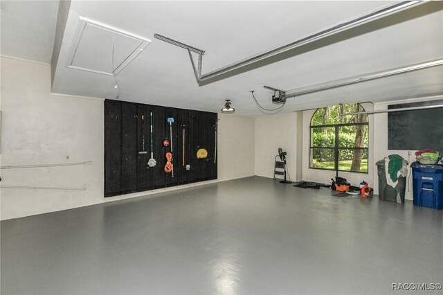 750 NW Snug Harbor Rd, Crystal River, FL 34428 - garage featuring a garage door opener