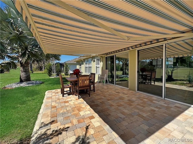 view of patio with outdoor dining area