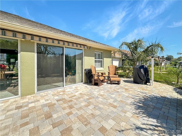 view of patio with a grill