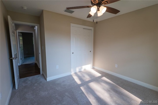 7792 N Susan Ave, Dunnellon, FL 34433 - unfurnished bedroom with carpet floors, a closet, and ceiling fan