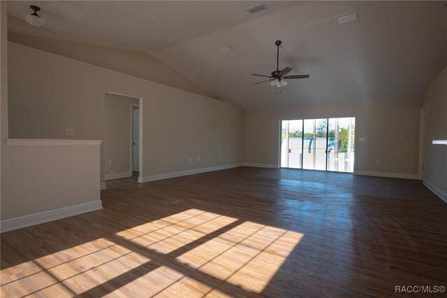 7792 N Susan Ave, Dunnellon, FL 34433 - empty room featuring wood finished floors, lofted ceiling, ceiling fan, and baseboards