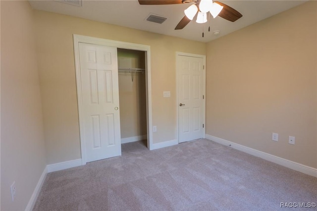 7792 N Susan Ave, Dunnellon, FL 34433 - unfurnished bedroom featuring carpet flooring, a closet, and ceiling fan
