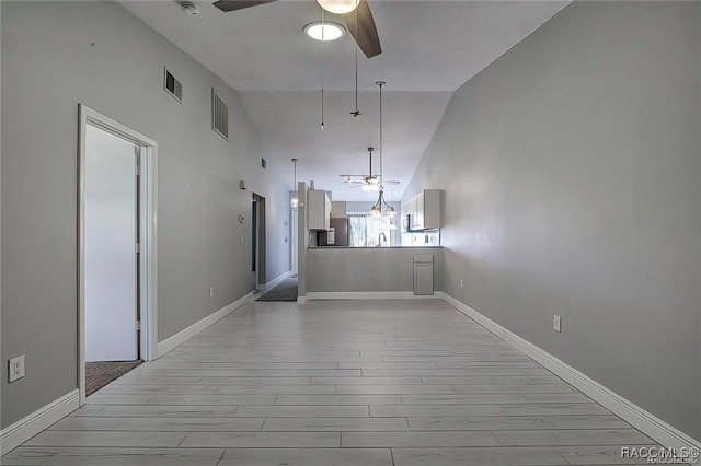 1309 Longboat Pt, Inverness, FL 34450 - interior space featuring light wood-type flooring, a sink, a ceiling fan, and visible vents