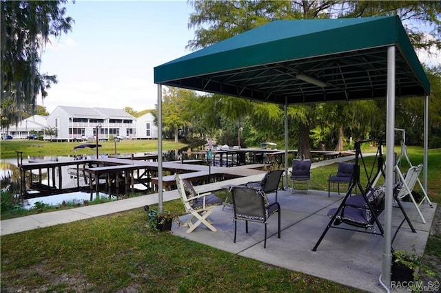 1309 Longboat Pt, Inverness, FL 34450 - view of community with a yard, a gazebo, and a water view