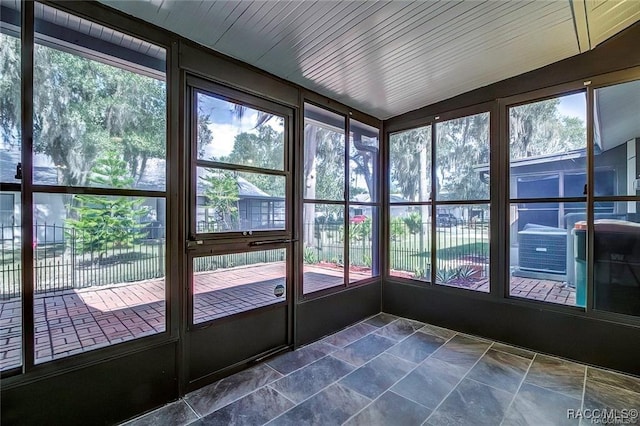 1309 Longboat Pt, Inverness, FL 34450 - unfurnished sunroom with stone tile floors
