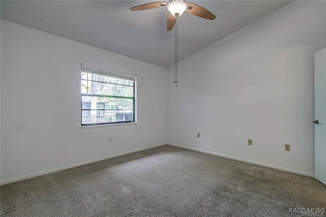 1309 Longboat Pt, Inverness, FL 34450 - unfurnished room featuring carpet floors, ceiling fan, vaulted ceiling, and baseboards