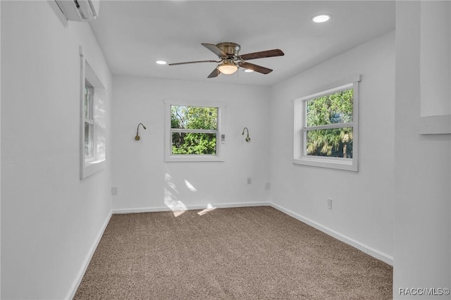 19190 SE 136th Ct, Dunnellon, FL 34431 - carpeted spare room with a wealth of natural light, a wall mounted air conditioner, baseboards, and recessed lighting