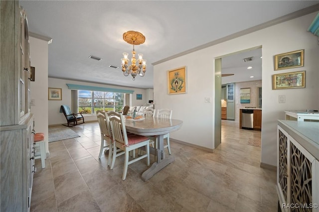 2160 N Watersedge Dr, Crystal River, FL 34429 - dining room with a chandelier and baseboards