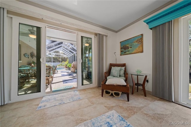 2160 N Watersedge Dr, Crystal River, FL 34429 - sitting room featuring ornamental molding and stone finish floors